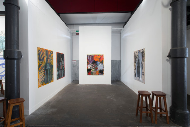 Installation view of paintings by Josh Smith