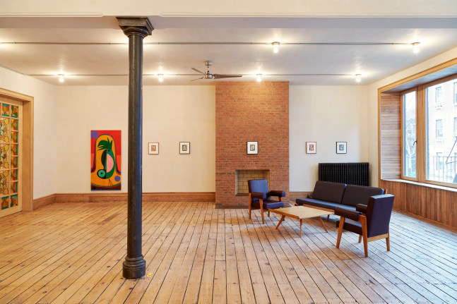 Installation view of paintings and drawings by Austin Eddy