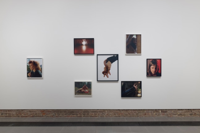 Installation view of photographs by Torbjørn Rødland