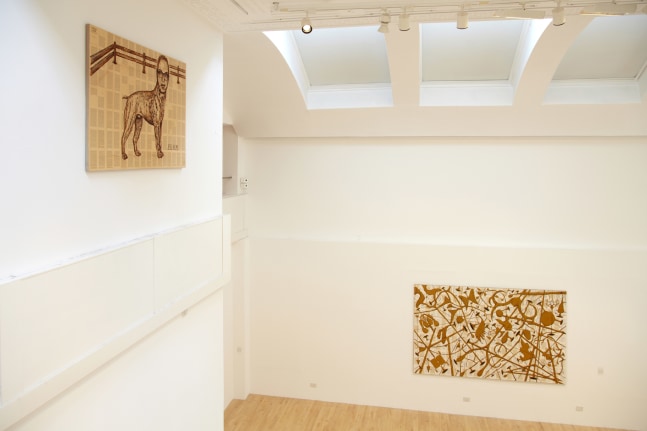 Installation view of works by Tim Rollins and K.O.S.