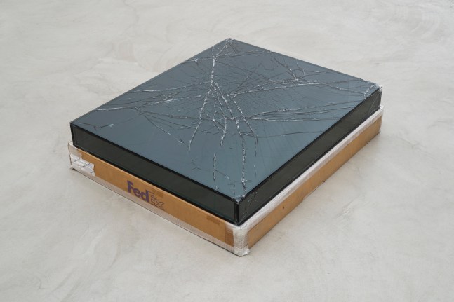 Sculpture by Walead Beshty, FedEx® Medium Framed Art Box 2011 FedEx 163095 REV 7/11, International Priority, Los Angeles–Geneva trk#775101486687, April 30–May 3, 2019, Priority Overnight, Geneva–Winterthur trk#776185723635, September 10–11, 2019 2019– Laminated Mirropane, FedEx shipping box, accrued FedEx shipping labels and tracking labels 10 x 85.5 x 71.5 cm / 4 x 33 3/4 x 28 1/4 in