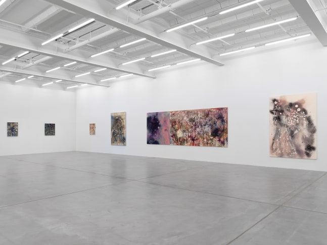 Installation view of Sam Falls paintings and ceramic reliefs exhibition