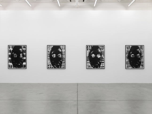 Installation view of Adam Pendleton and Pope.L wall-based works and sculptural installation