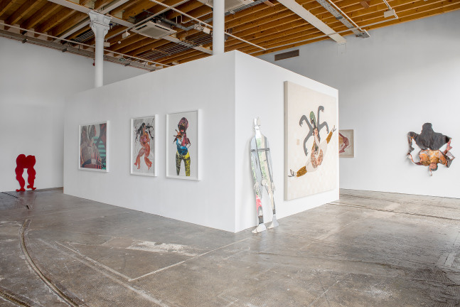 Installation view of paintings by Tschabalala Self