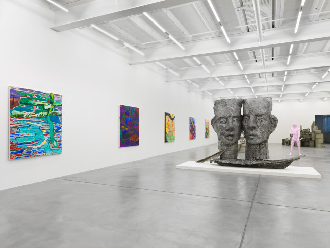 Installation view of group painting, sculpture, and film exhibition