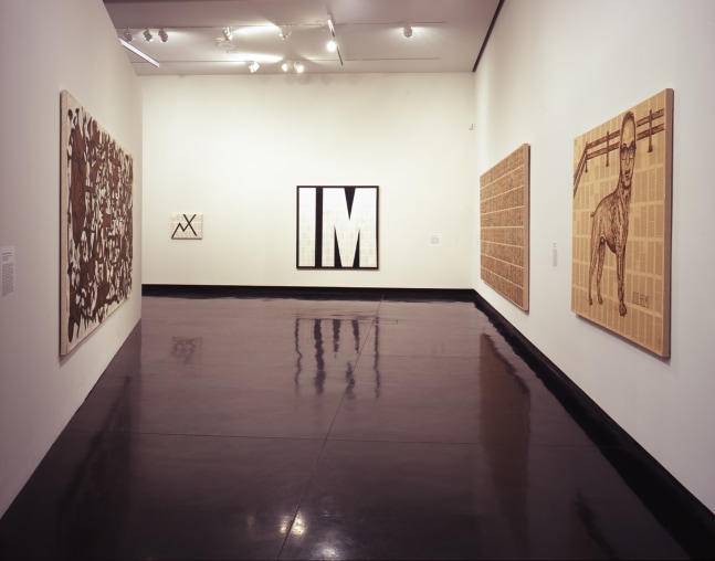 Installation view of paintings by Tim Rollins and K.O.S.