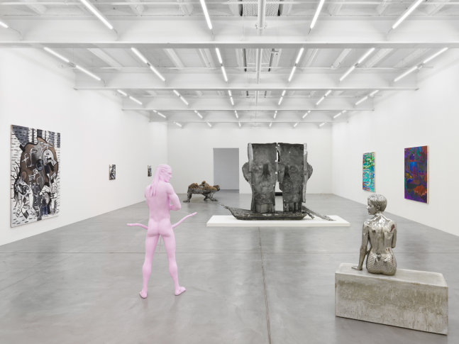 Installation view of group painting, sculpture, and film exhibition