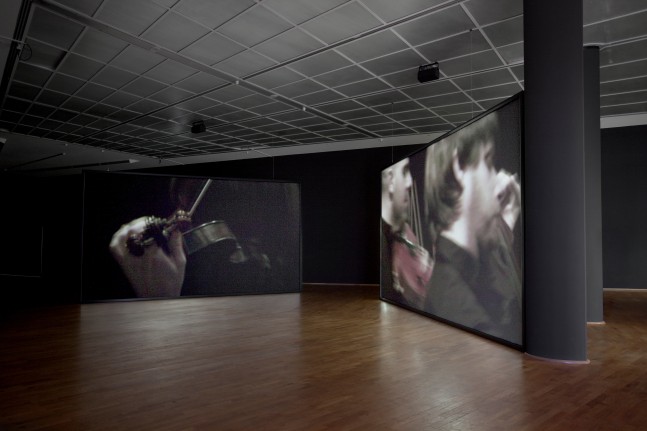 Installation view of video work by Douglas Gordon