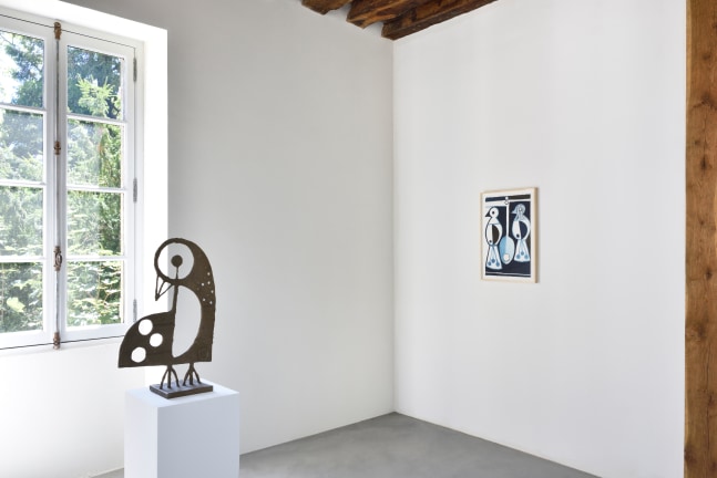 Installation view of paintings and sculptures by Austin Eddy