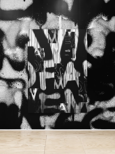 Installation view of Liam Gillick and Adam Pendleton films and wall-based works