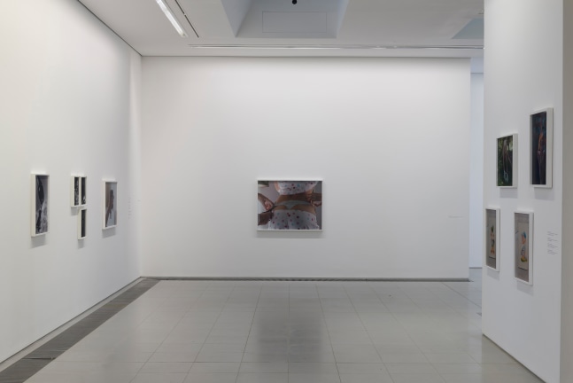 Installation view of photographs by Torbjørn Rødland