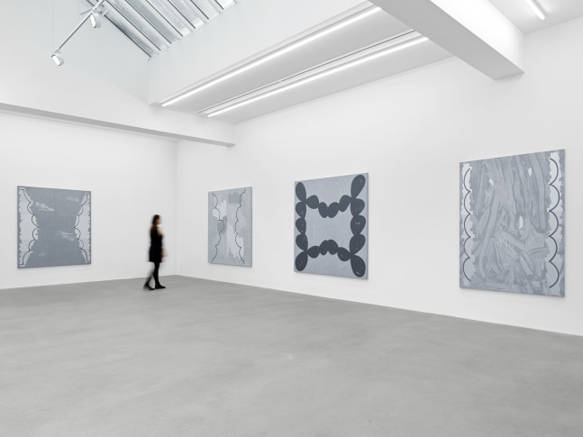 installation view of grayscale paintings by Amy Feldman