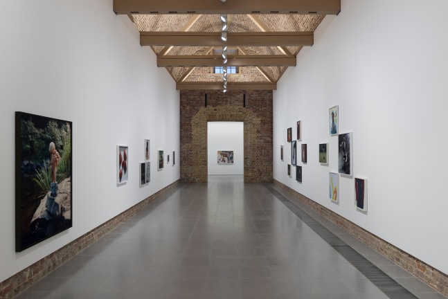 Installation view of photographs by Torbjørn Rødland