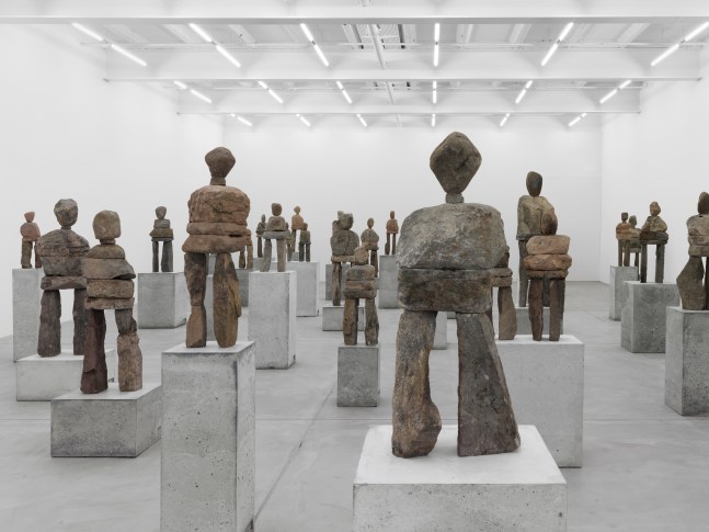 Installation view of Ugo Rondinone stone figure sculptures