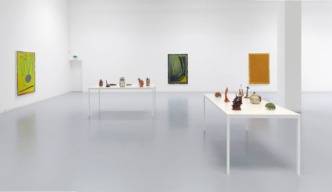 Installation view of sculptures and paintings by Josh Smith