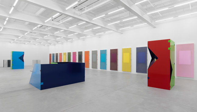 Installation view of Sam Falls paintings and sculptures exhibition