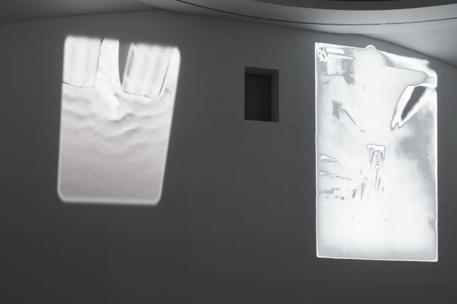 Installation view of videos by Trisha Donnelly