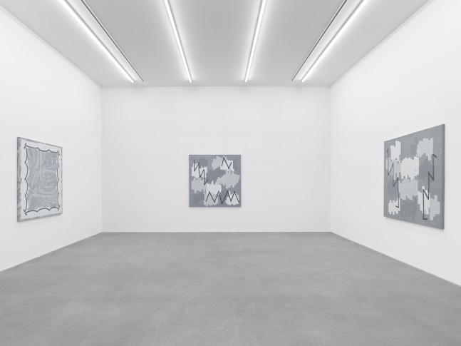 installation view of grayscale paintings by Amy Feldman