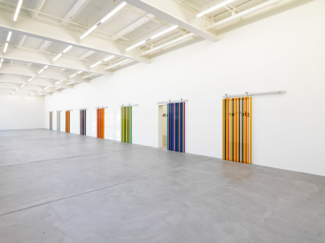 Installation view of Liam Gillick wall-based graphic works and wall hangings exhibition