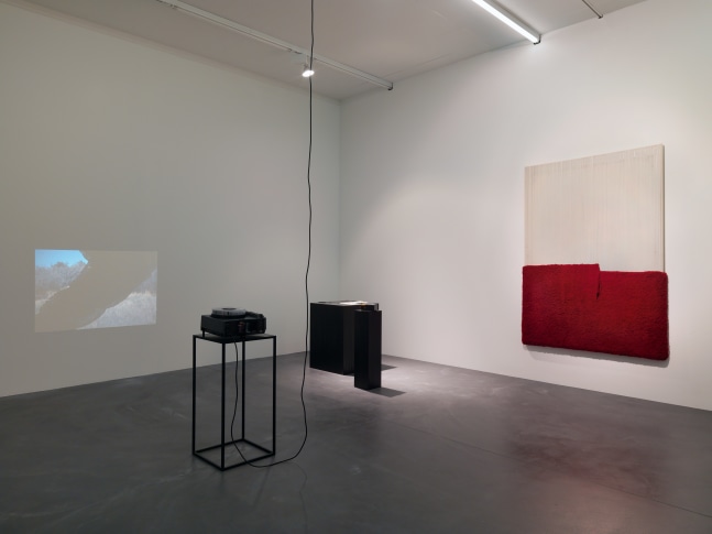 Installation view of paintings, video works and wall works by Latifa Echakhch