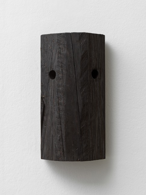 black wooden wall object by Oscar Tuazon