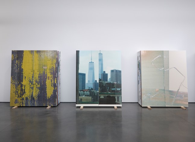 Installation view of sculptures by Peter Fischli and David Weiss and works by Wade Guyton