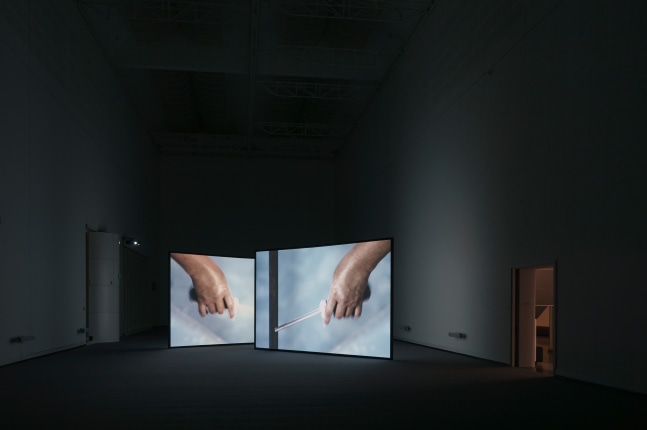 Installation view of video work by Douglas Gordon