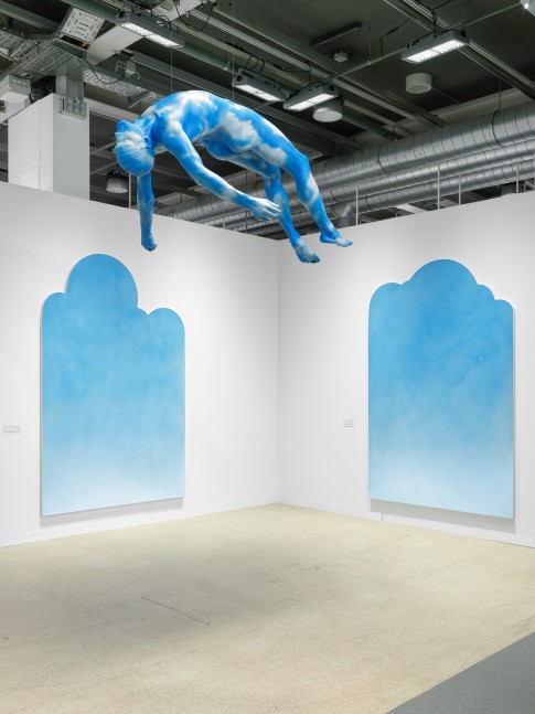 installation view of paintings and sculptures by various artists