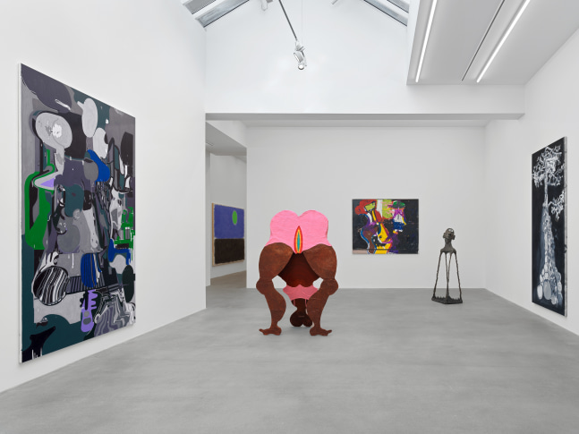 Installation view of group painting, print, and sculpture exhibition