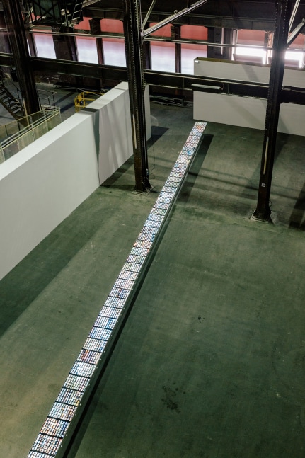 Installation view of images by Peter Fischli David Weiss