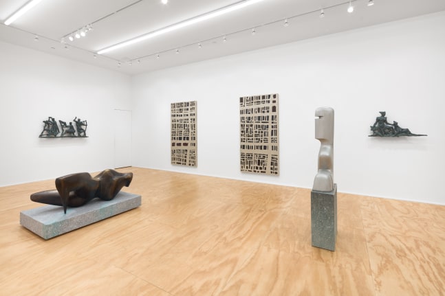 Installation view of sculptures and wall works by Valentin Carron