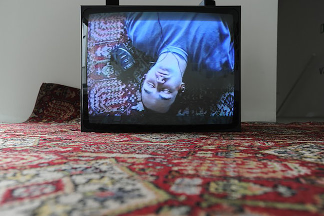 Installation view of video work by Douglas Gordon