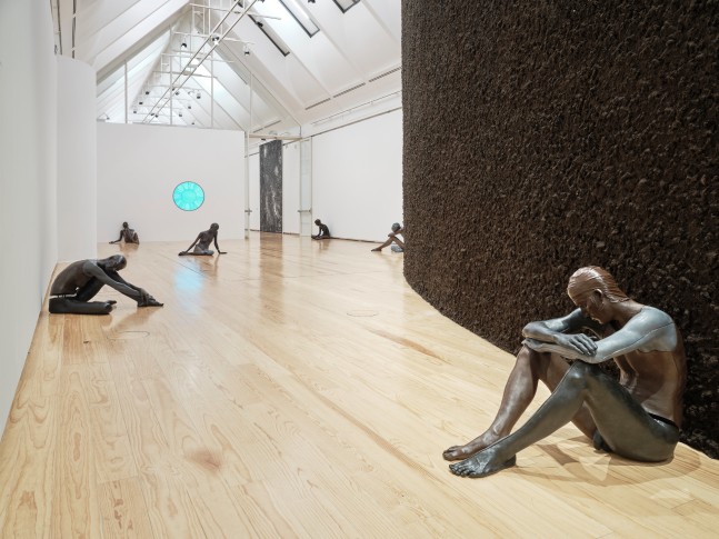 Installation view of paintings and sculptures by Ugo Rondinone