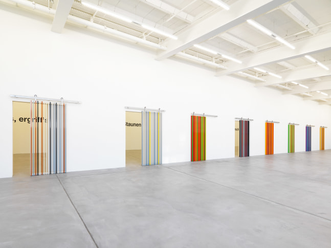 Installation view of Liam Gillick wall-based graphic works and wall hangings exhibition
