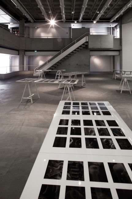 Installation view of photographs by Peter Fischli and David Weiss