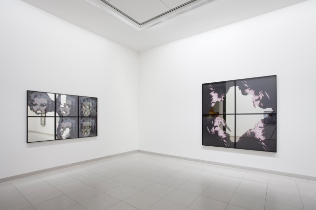 Installation view of photographs by Douglas Gordon