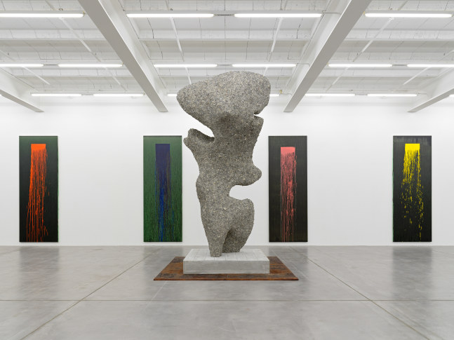 Installation view of paintings by Pat Steir and sculptures by Ugo Rondinone