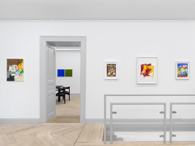 Installation view of group painting, photography, and sculpture exhibition