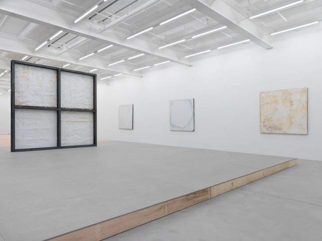 Installation view of Oscar Tuazon sculptures and floor installation exhibition