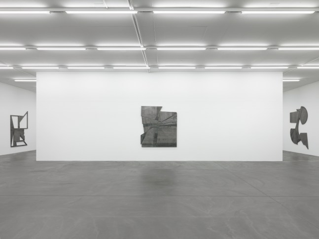 Installation view of Wyatt Kahn wall reliefs and photographs