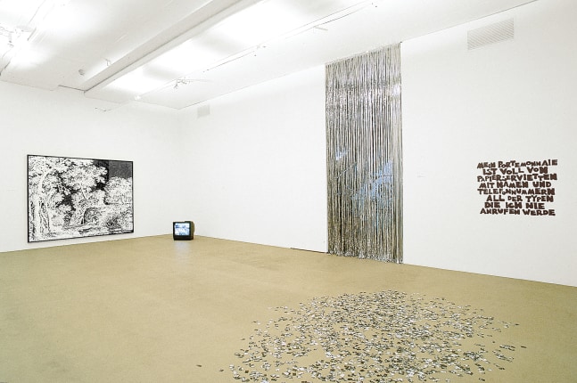 Installation view of sculptures and paintings by Ugo Rondinone