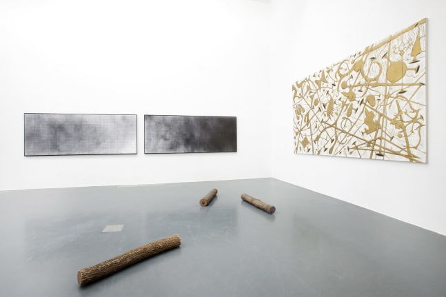 Installation view of paintings by Tim Rollins and K.O.S.