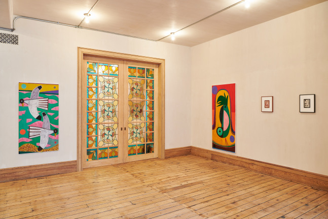 Installation view of paintings and drawings by Austin Eddy