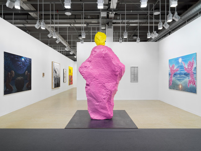 installation view of works by various artists at the Art Basel booth