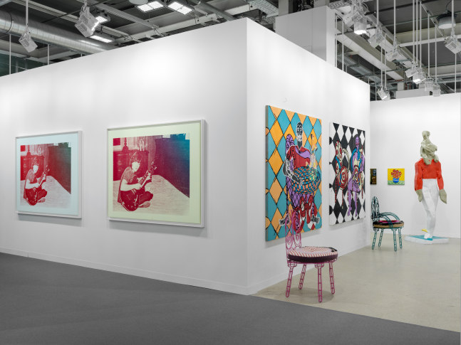 installation view of paintings and sculptures by various artists