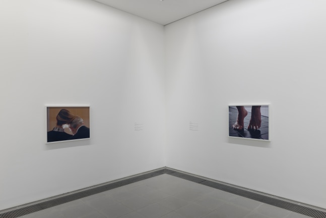 Installation view of photographs by Torbjørn Rødland
