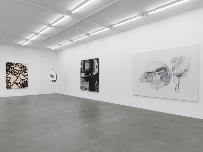 Installation view of group painting, photography, and sculpture exhibition
