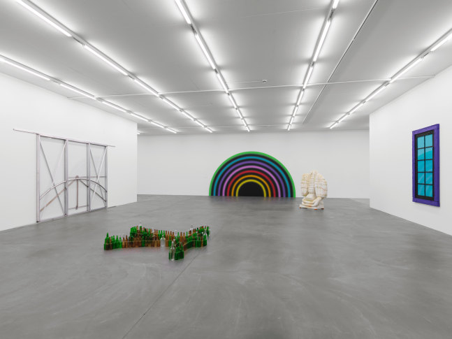 Installation view of group painting, photography, and sculpture exhibition