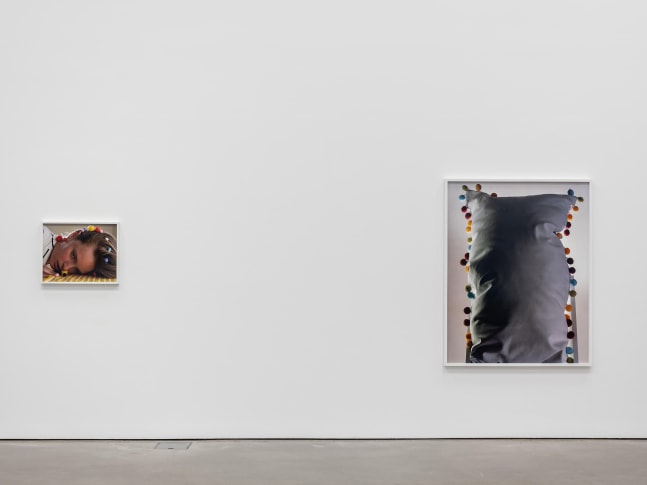 Installation view of photographs by Torbjørn Rødland