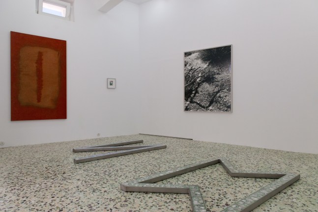 Installation view of Sam Falls paintings and sculptures exhibition